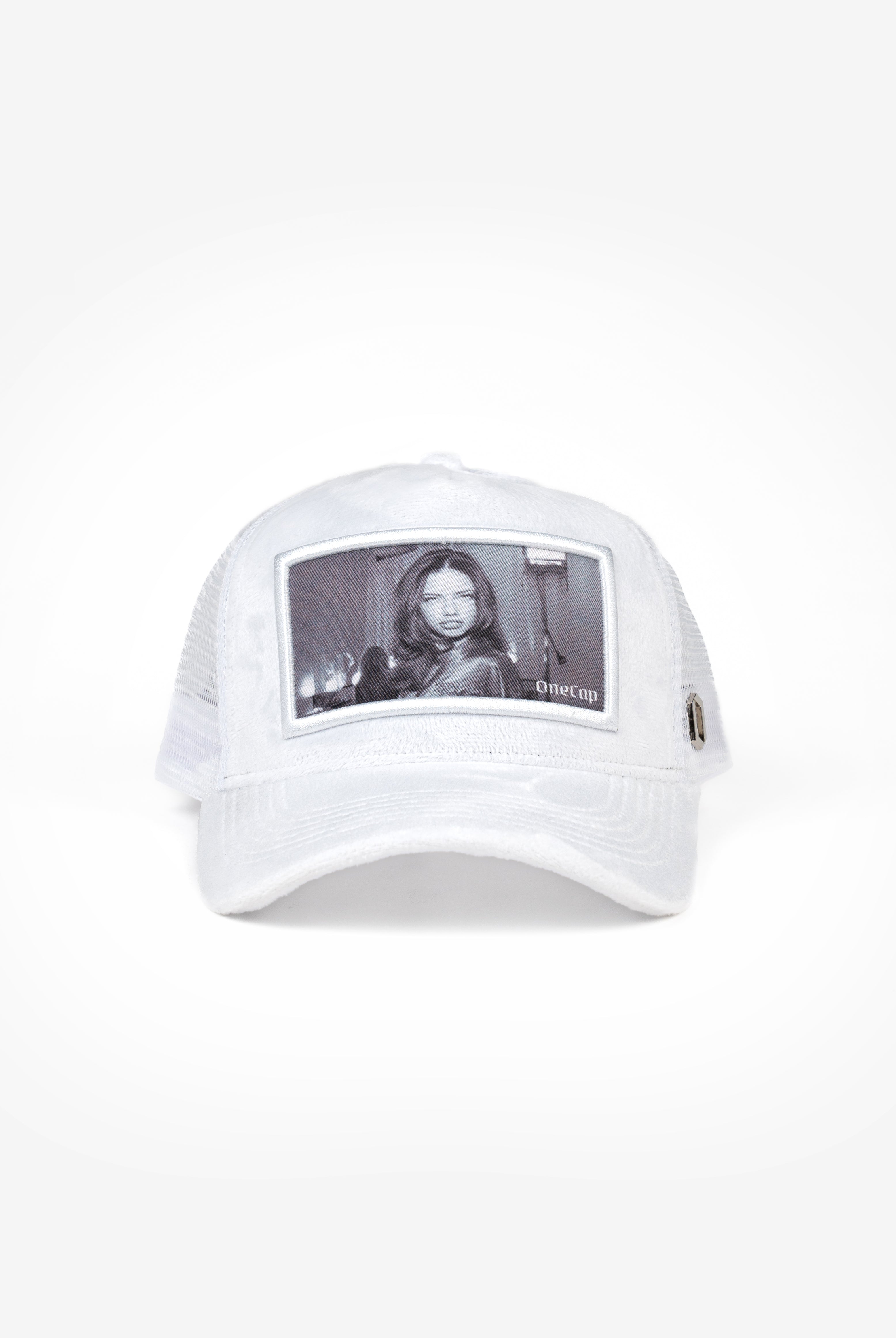 White cap featuring a printed image of Adriana Lima with a clear plastic cover