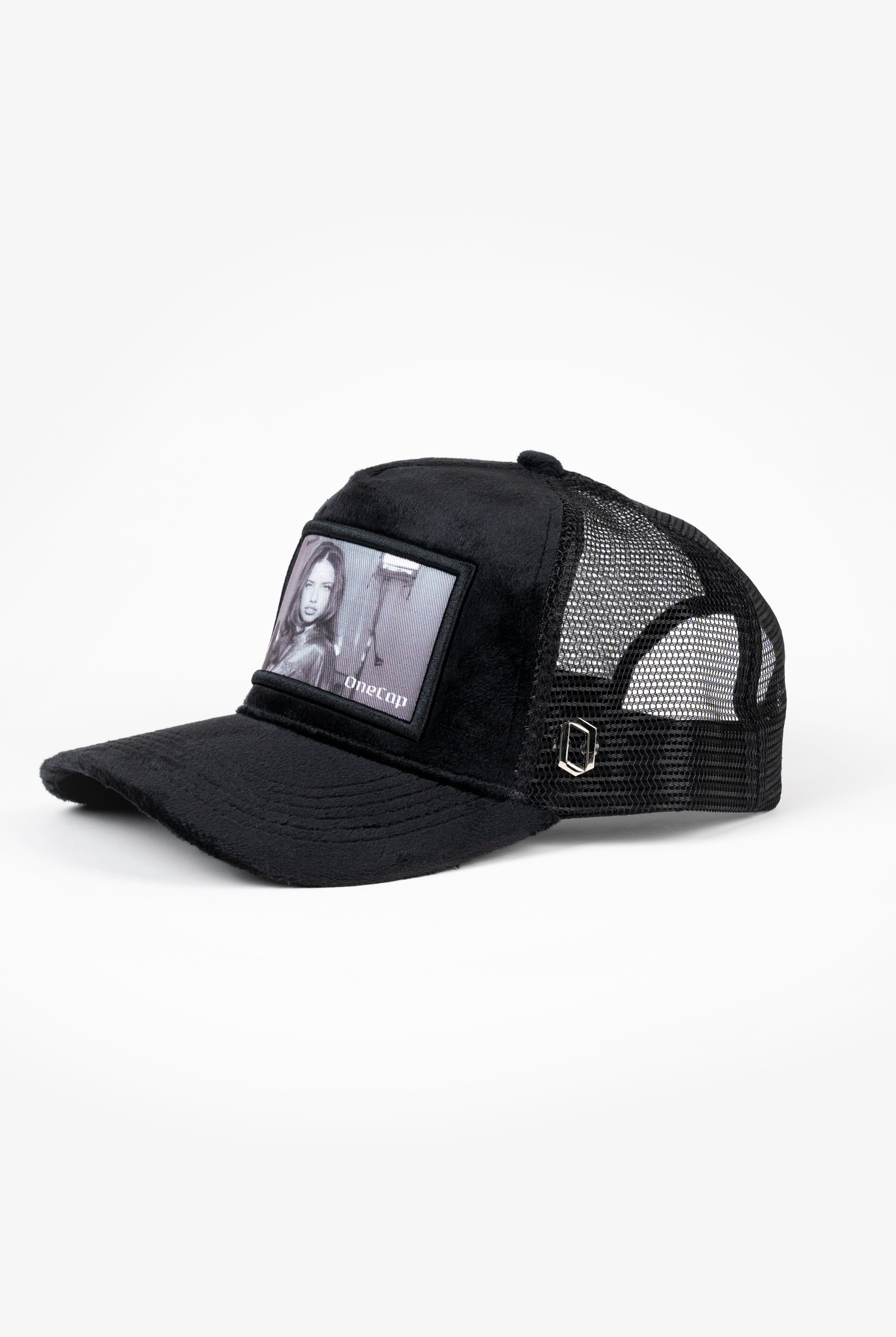 Black mesh cap featuring a patch with the image of Adriana Lima, supermodel and actress, known for her striking blue eyes and dark hair.