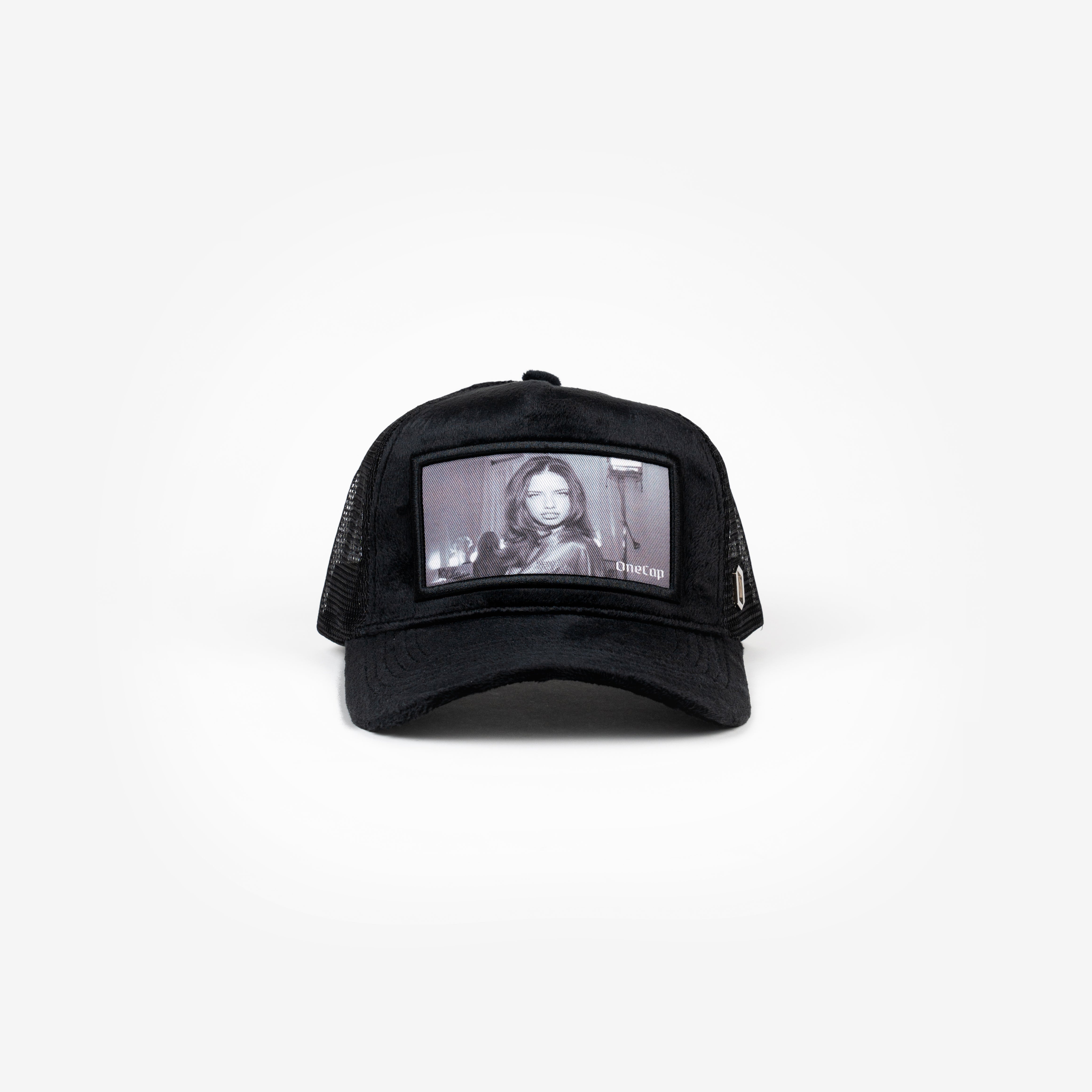 Black mesh cap featuring a photo of a famous model and actress on the front panel