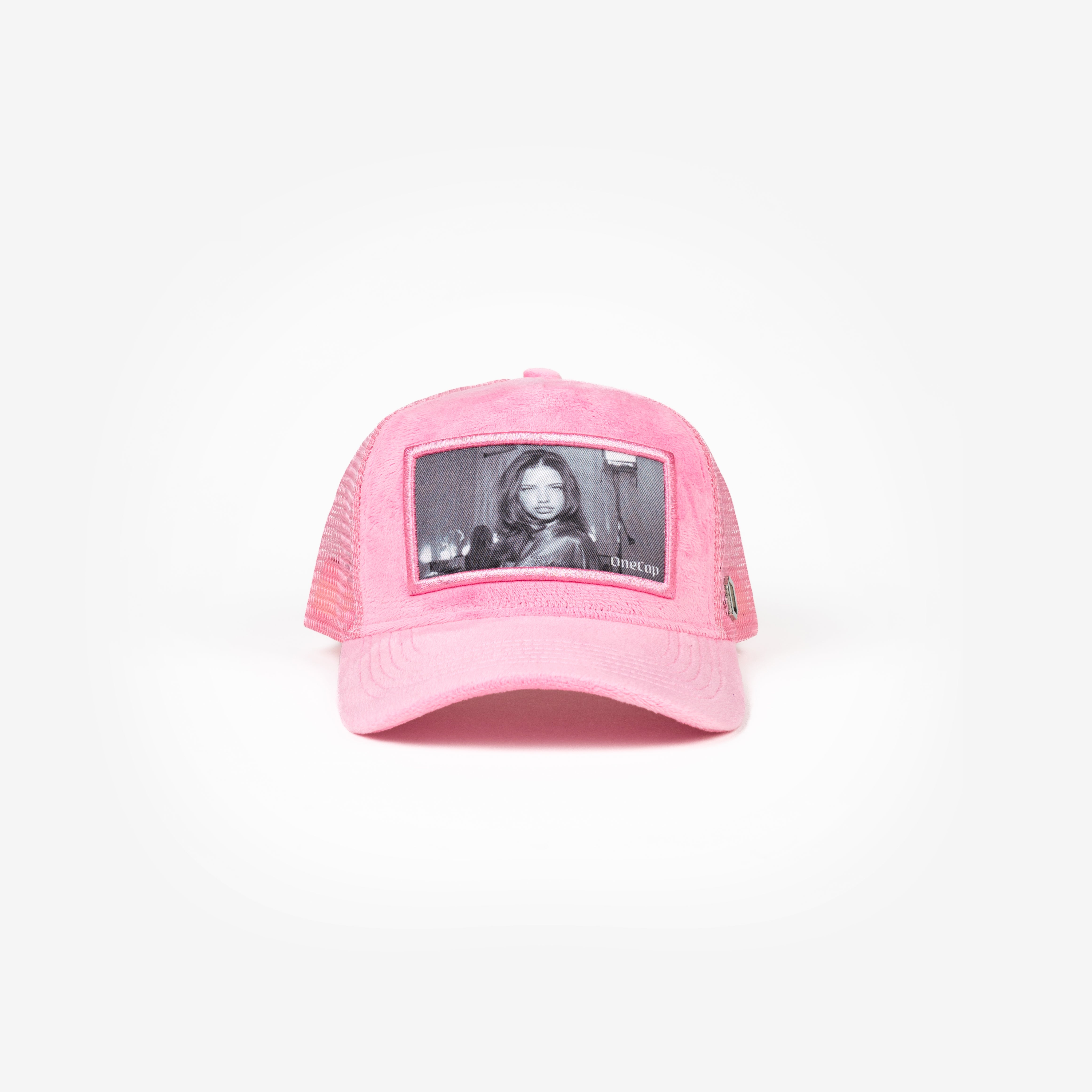 Pink baseball cap featuring a black-and-white image of a model in the front panel.